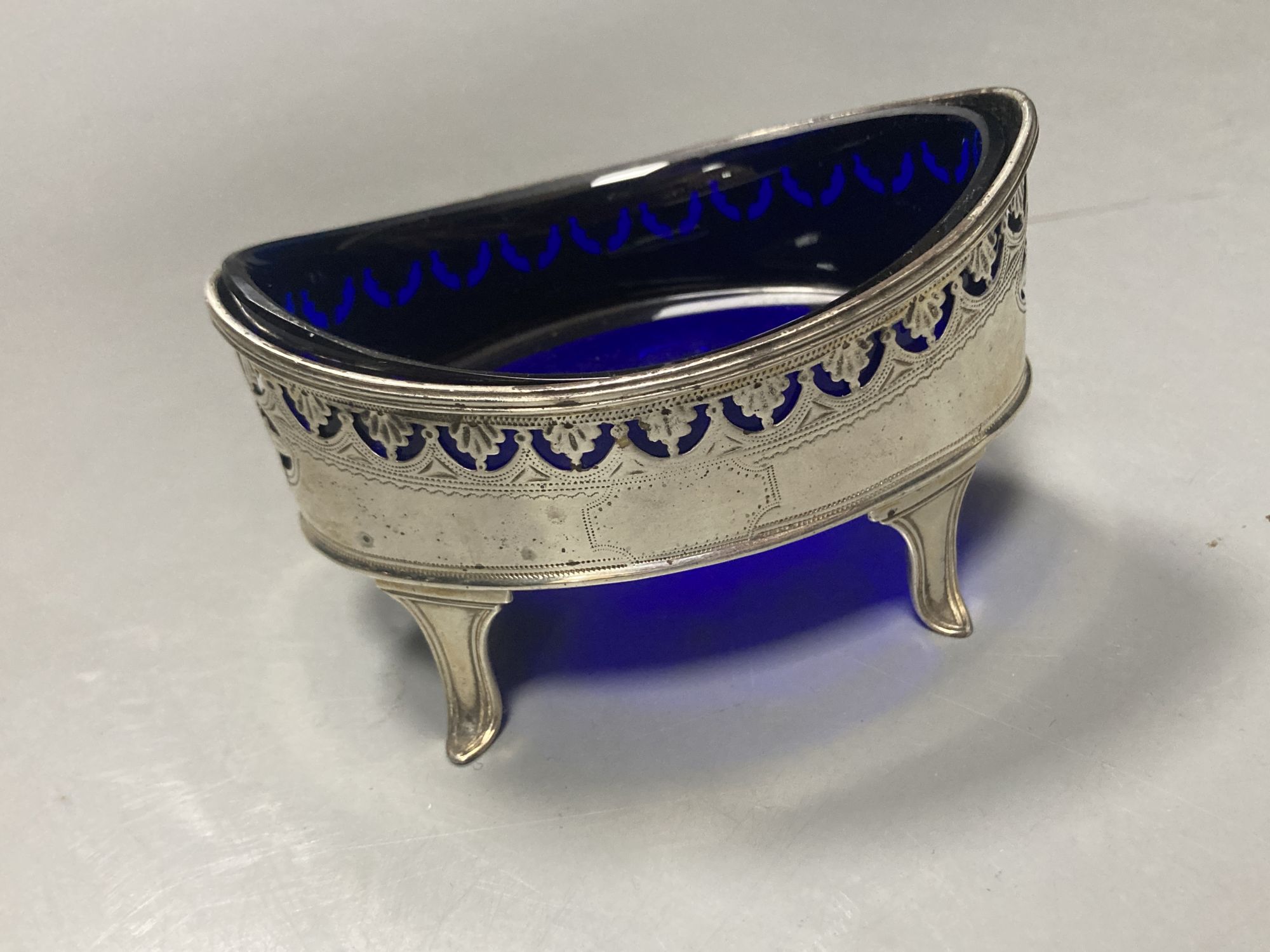 An Edwardian silver seven bar toastrack, William Hutton & Sons, Sheffield, 1909, a.f., a pair of George III silver salts etc.